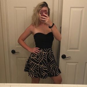 Cute mini black and gold dress